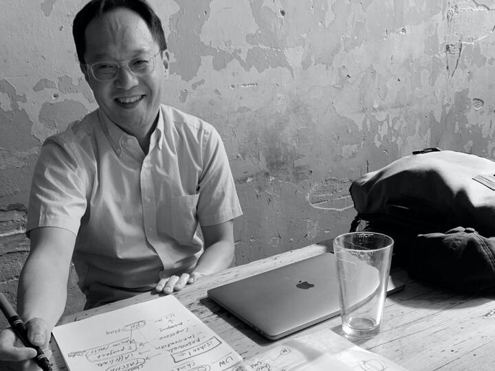 Whiteboard with a lot of text and diagrams